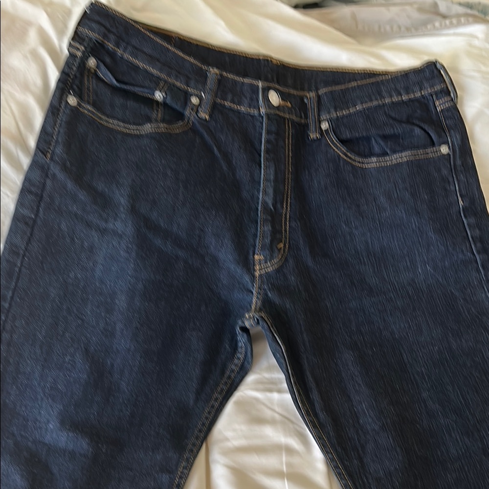 Blue Straight Jeans with Sturdy Fabric and Classic Rivets